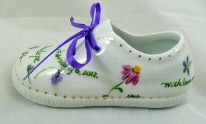 Celebrate Life 18 hand painted & personalized porcelain baby shoe